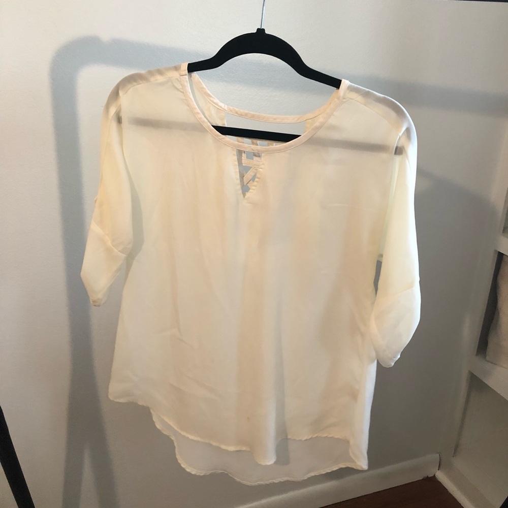 Cute white tunic with pleather accent back/trim